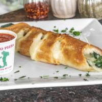 Spinach Roll · Baked spinach roll with ricotta and mozzarella cheeses.