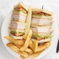 Turkey Club · Thinly sliced turkey, tomato, bacon, lettuce, and mayo form the quintessential sandwich.