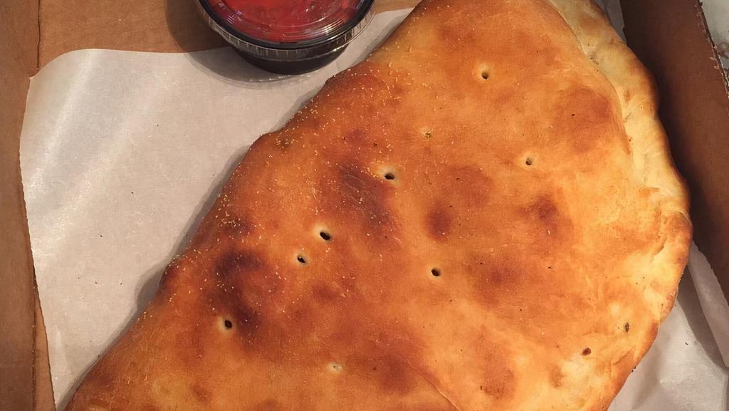 Calzones · Dough with cheese and one filling inside and marinara on the side.. Choose your fillings from our huge list of fresh pizza toppings. Extra fillings for an additional charge each.