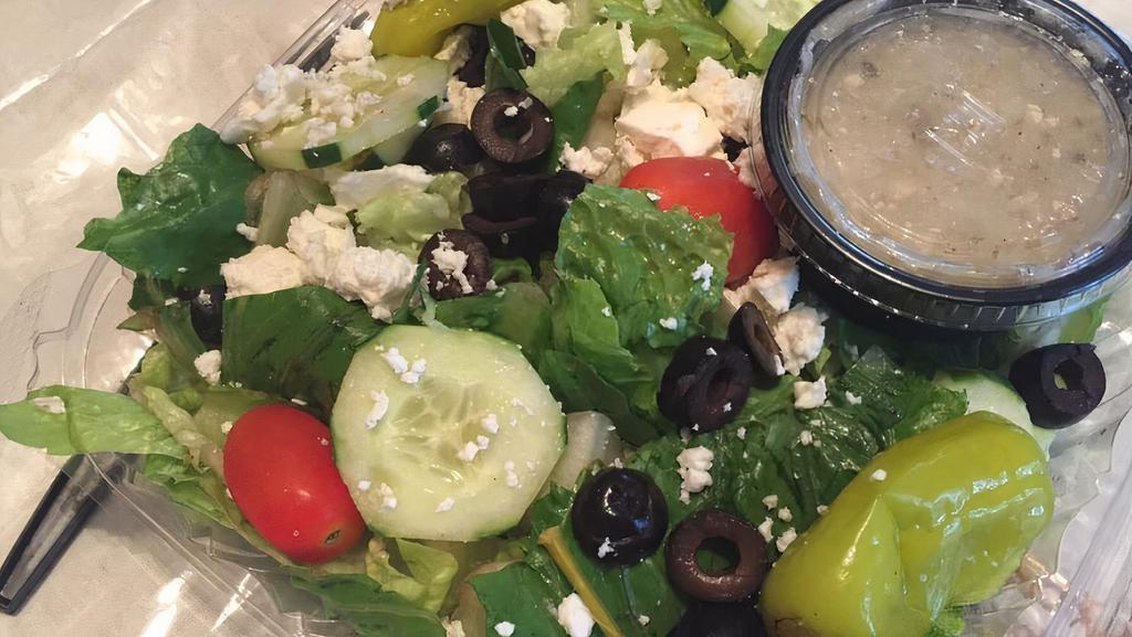 Greek Salad · Romaine with feta crumbles, tomato, black olives, pepperoncini, cucumbers, Greek dressing. With chicken for an additional charge.