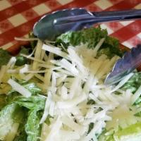 Caesar Salad · house dressing, anchovies, garlic, croutons, romano, tomatoes