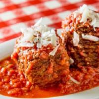 Grandma Grace'S Meatballs · two 4oz meatballs made of beef and pork, tomato sauce, and coarsely grated cheese