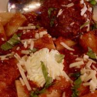 Rigatoni & Meatball · 4 oz meatball (Beef + Pork) with a dollop of ricotta cheese served over Rigatoni noodles