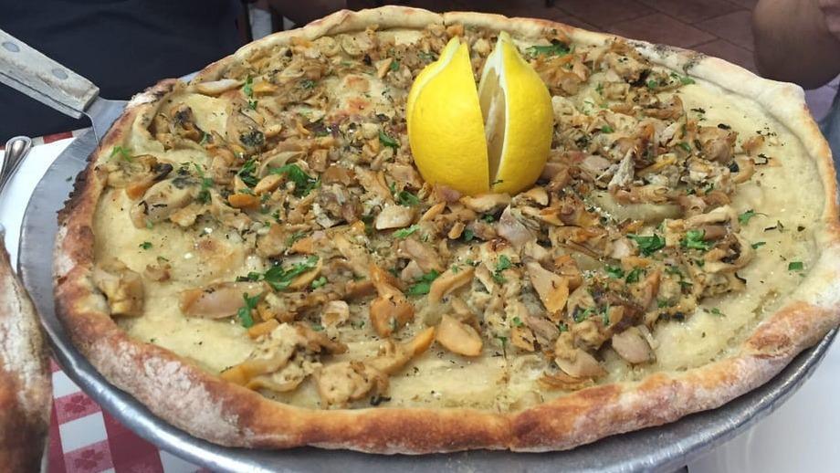 Clam Pie (May Contain Shell / Sand) · no sauce or cheese, baby clams, garlic, seasoning