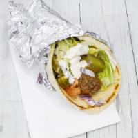 Falafel Sandwich · Comes with lettuce tomatoes & please tell us if you want white sauce and hot sauce on it - p...