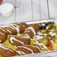 Falafel Over Rice · Comes with lettuce tomatoes please tell us if you want white sauce -and hot sauce on it plea...