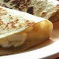 Quesadillas · Served with a side of salsa and sour cream.