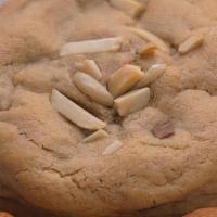 Italian Almond Cookie · 5 oz brown sugar cookie stuffed with almond paste and mixed with slivered almonds.