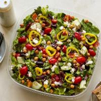 Greek Out Salad Platter · Chopped romaine, crunchy chickpeas, mediterranean herbs, feta cheese, grape tomatoes, cucumb...
