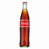 Mexican Coca-Cola · Classic Coca-Cola sweetened by pure cane sugar.
