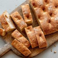 Herbed Focaccia Bread (V) · Individual portion, serves one.  Made by tribeca oven with a small-batch, handcrafted approa...