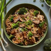 Sesame Garlic · Freshly made whole wheat noodles, roasted beef, mushrooms, broccoli, scallions, toasted sesa...