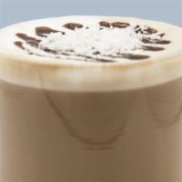 Coconut Dream Hot Latte · Coconut and chocolate syrup finished with whipped cream, chocolate, and coconut flakes.