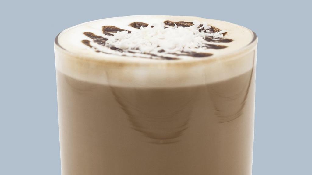 Coconut Dream Hot Latte · Coconut and chocolate syrup finished with whipped cream, chocolate, and coconut flakes.