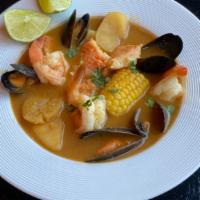 Seafood Soup 25 Oz · Mussels, fish and shrimp, corn, plantains soup