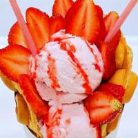Strawberry Kisses · Waffle with 2 scoops of strawberry ice cream. Topped with strawberry and pocky.