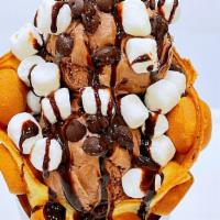 Chocolate Lover · Waffle with 2 scoops of chocolate ice cream. Topped with marshmallow and chocolate chip.