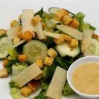 Caesar Salad · Serves 15-20. romaine lettuce cucumbers croutons topped with shaved parmesan cheese.