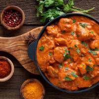 Butter Chicken Mild Spicy · Farm fresh chicken, tomato sauce, and a slew of aromatic spices. The chef special.