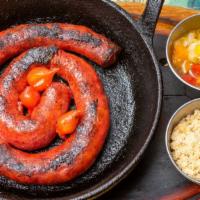 Linguica Caseira Acebolada · Brazilian sausage onion sauteed, farofa, vinagrette
