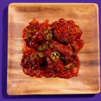 Sweet Chili Wings · Fried chicken wings coated in sweet chili sauce.
