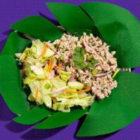 Larb Salad · Larb salad with fresh lime juice, onions, mint, chili flake with your choice of meat.