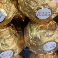 4 Ferrero Rocher Chocolates  · Add 4 Ferrero Rocher chocolates to your bouquet or arrangement.