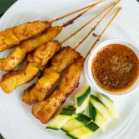 Satay Chicken (6Pc) · Grilled marinated meat on a skewer cucumber, onion with peanut sauce.