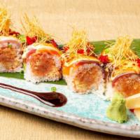 Out Of Control Roll · Spicy tuna, basil and apple. Topped with seared yellowtail, salmon and tuna with soy bean pa...