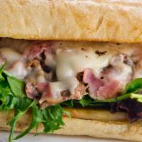 Hungry Man Sandwich · Juicy roast beef, pastrami, swiss cheese, onions, mushrooms and mustard.