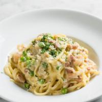 Carbonara · Spaghetti, pancetta, egg, pecorino, cream, peas.