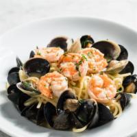 Pescatore · Spaghetti, shrimp, mussels, clams, marinara or garlic olive oil.