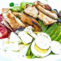 Greek Cobb Salad · Romaine, Cucumbers, Tomatoes, Olives, Feta and Hard-Boiled Eggs