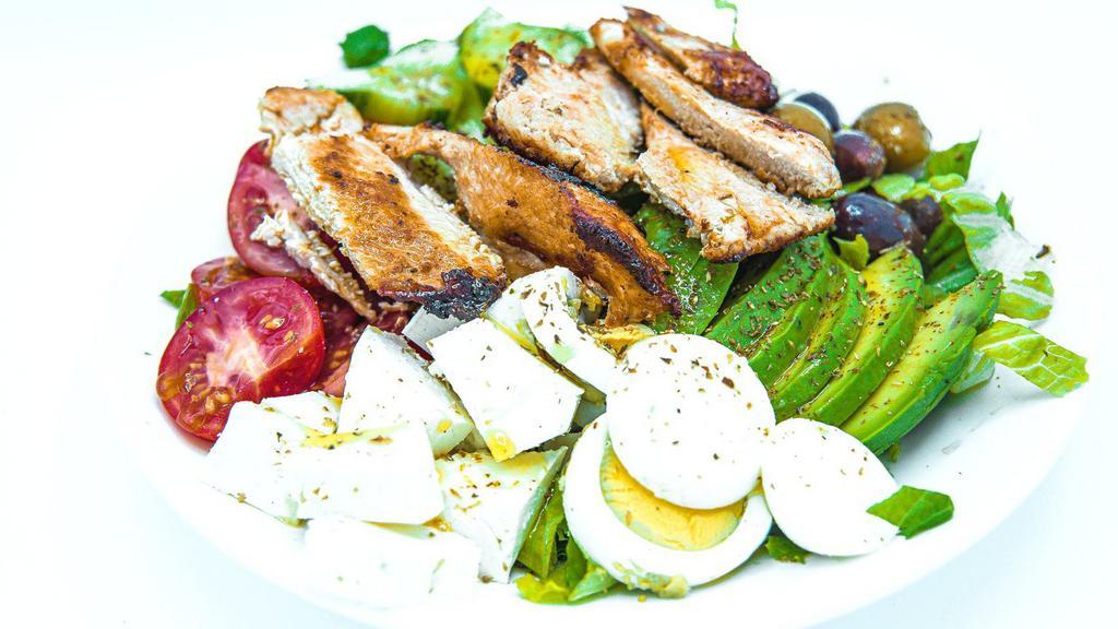 Greek Cobb Salad · Romaine, Cucumbers, Tomatoes, Olives, Feta and Hard-Boiled Eggs