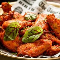 Butter Chicken Wings · chicken wings, makhani sauce, sesame