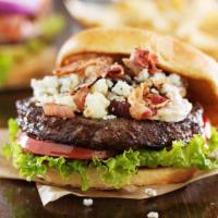 The Hickory Bacon Blue Burger · Smoked bacon, Danish blue cheese, crispy onions, hickory BBQ, lettuce, tomatoes, and house s...