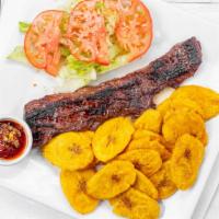 Churrasco Mofongo · Plantain and/or yucca, grilled churrasco, fried pork and cheese.