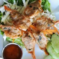 Fried Angel Shrimp (6Pc) · Deep-fried shrimp with marinated ground pork. Served with sour sauce.