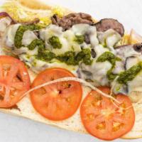 The Maradona · Grilled beef with provolone cheese, lettuce, tomato, red onion & chimichurri sauce.