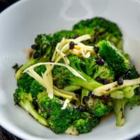 Wok Charred Broccoli · Garlic and black beans.
