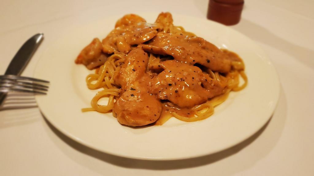 Chicken & Shrimp Au Poivre · Over pasta, creamy peppercorn with a touch of brandy.