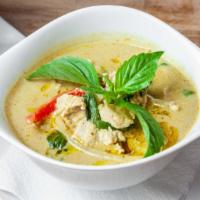 Green Curry · Spicy. Green curry, coconut milk, bell peppers, bamboo shoots, eggplants and basil. Served w...