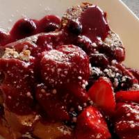 Very Berry Stuffed French Toast · Our classic stuffed with lemon zest mascarpone cheese, topped with fresh berries and raspber...