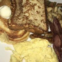 The Hungry Sampler · Buttermilk pancakes, classic french toast, two eggs, bacon and sausage.