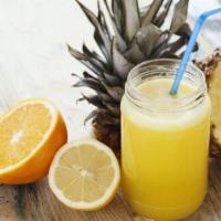 Sunrise Juice · Fresh juice made with Pineapple, orange and carrot.