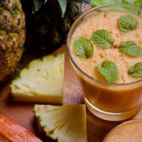 Tropical Island Smoothie · Fresh smoothie made with Papaya, strawberry, fruit punch and pineapple.