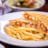 Chicken Parmigiana Panini · Grilled Panini Sandwich made with European Flatbread and topped with Breaded chicken, fresh ...