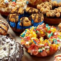 Build Your  Own 1/2 Dozen · Select from over 50 donuts and specialties for your perfect half dozen.