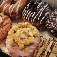 Cheesecake Lovers 1/2 Dozen · 6 random cheesecake donuts from our selection