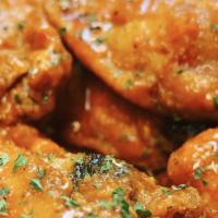 Wings · Fried and tossed in homemade sauces.